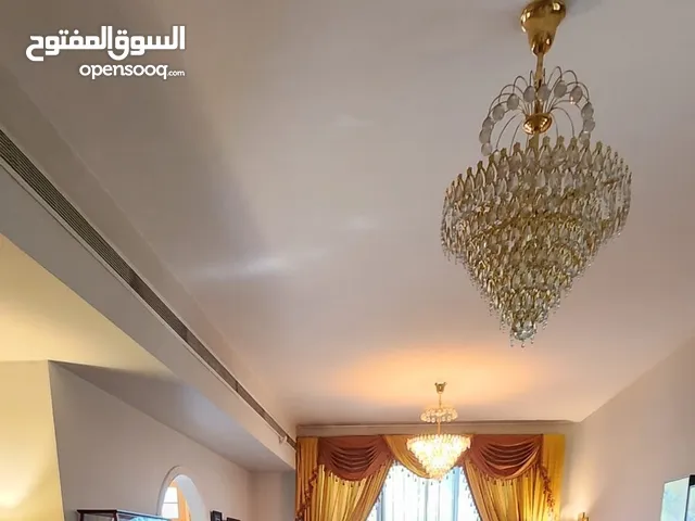 classic chandelier golden colour 2 pieces for 500 working condition
