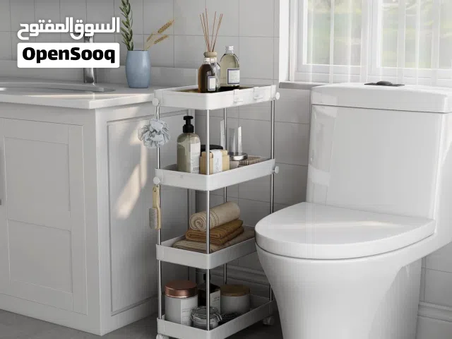 Bathroom organizer in stock with wheels and holes at the bottom Stainless steal
