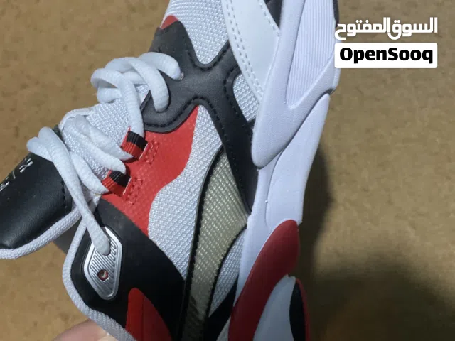 Red and white puma x-ray sneakers