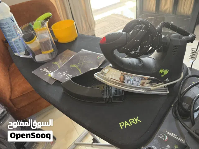 جهاز مكواة يعمل بالبخار