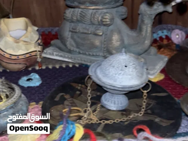 مبخره على شكل جمل ومبخره مصنوعه من التوج قديمه سعرهم 15 دينار