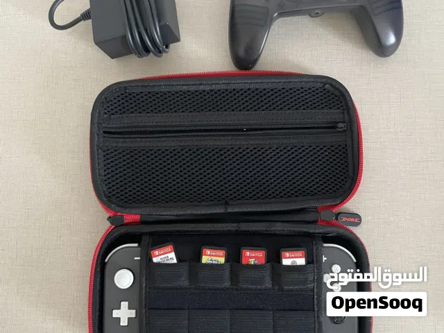 Nintendo switch lite for sale with 4 games, charger, case, and controller. dm for more info