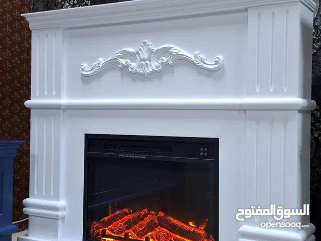Electric Fireplace Heather #مدفأة #ديكور #الحطب المدفأة تشتغل بالكهرباء وبها #تدفئة التدفئة مستوي