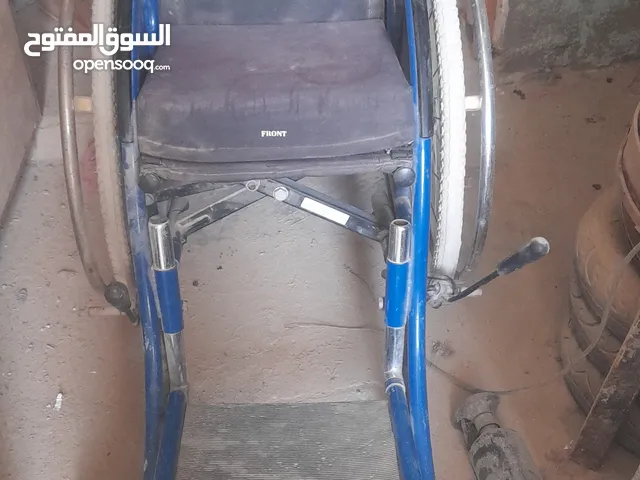كرسي معوقين دفع