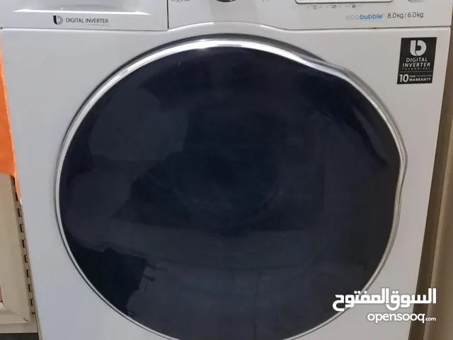 غسالة مع تنشيف 100% بحالة ممتازة