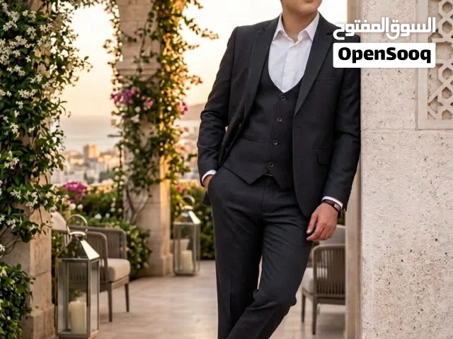بدلة رجالية رسمية كاملة - لون أسود أنيق - حالة ممتازة