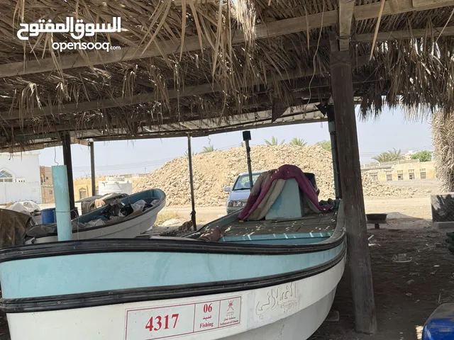 قارب 23 ومكينة 115