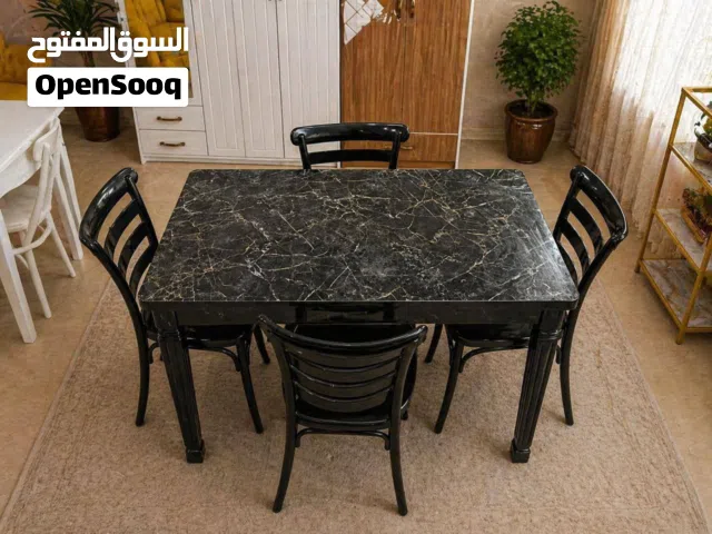 ميز طعام 4 كرسي لفتره محد سطح الميز خشب رجل حديد كرسي عظم عاج قياس الميز 120*70سم