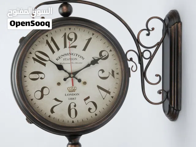 : ساعة حائط كلاسيكية معدنية ذات وجهين طراز Kensington Station لندن