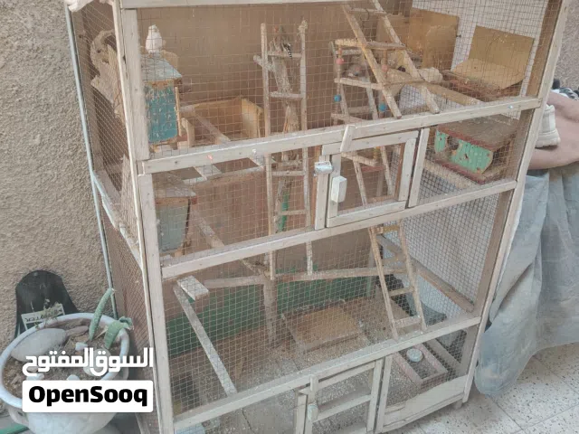 قفص طيور مع فناحس