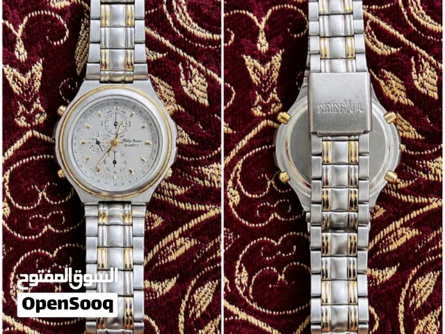 ساعة Philip Persio Quartz *لون فضي مع تفاصيل ذهبية *بحالة جيدة ومستعملة استخدام خفيف