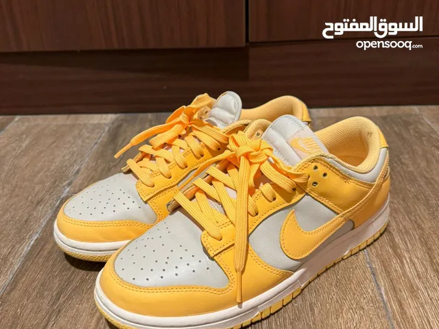 Nike dunk low yellow and white