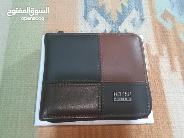تشكيلة محافظ جلد رجالي كلاسيك