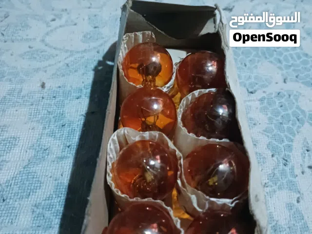 كنز لملاك الكاديلاك الكلاسيك 57-60 لمبات الفرامل الخلفية الأصلية GG موديل نادر: 1034 ASBEST أمريكي