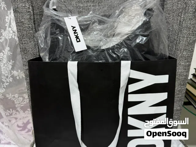 شنطة DKNY اسود وذهبي