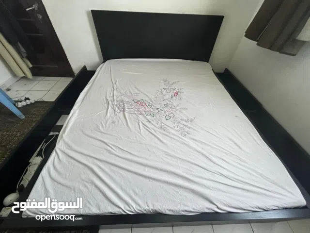 Double wood bed with original medical matress l