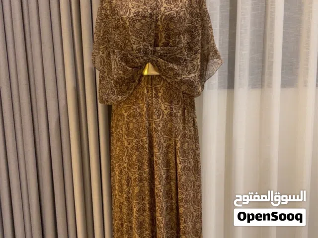 فستان سهرة ذهبي بلمعة