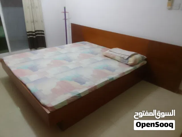 Double bed,dressing table nd double door cupboard.