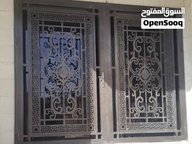 باب حماية حديد درفتين مع الحلق مع الزرفيل للبيع