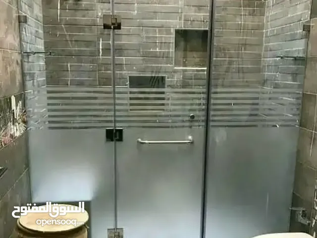 زجاج سكريت ومرايات وأبواب زجاج وطاولات الطعام