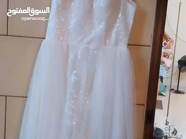 فستان اعراس قابل لتفاوض