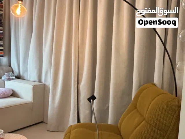 Recliner with leg rest & phone holder