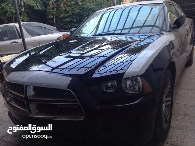 دوج جارجر موديل 2013 لون اسود خليجي وكالة مكفولة بدون اي ضرر