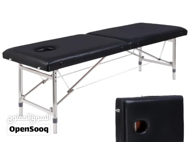 سرير المساج القابل لطي لسهولة التنقل فيه عندما ينطوي يصغر حجمه لقدر شنته لتحمل عالي وجوده عاليه ...