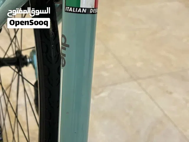 A 700c aluminum frame fitness bike with mid-range components and rim brakes.  Compare the full range