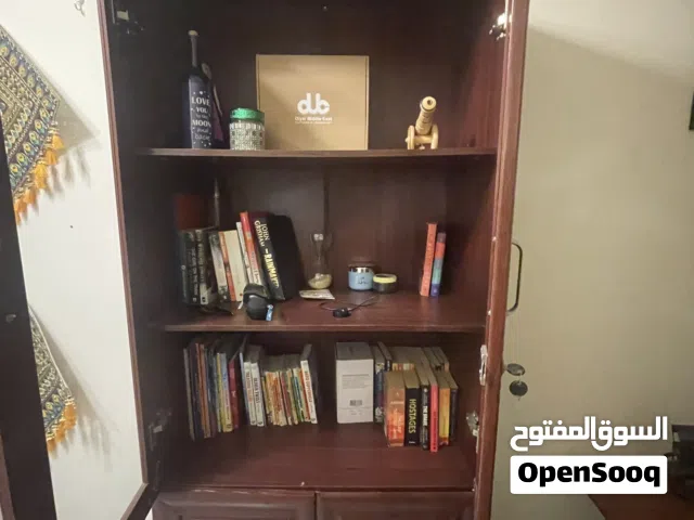 Book cabinet or Almirah with glass door, 2 top shelves, 3 bottom drawers and one bottom storage
