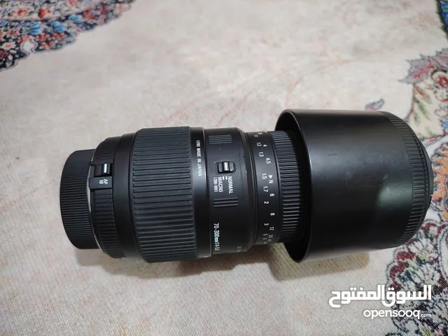 عدسة كامرة نيكون. نضيفه خدش ما بيه باقي التفاصيل جوا