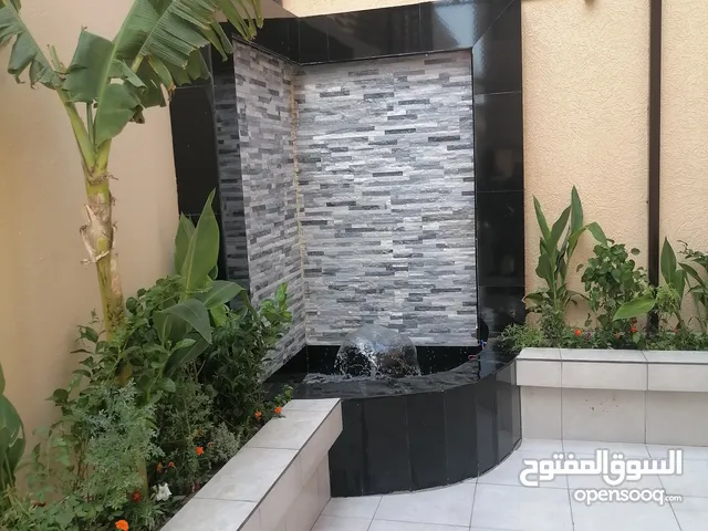 تنسيق حدائق شلالات نوافير تيل طبيعي