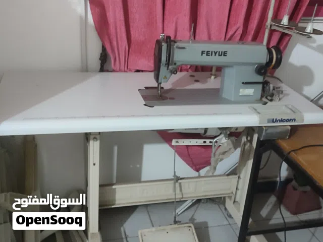 مكينة خياطة توظيب القماش