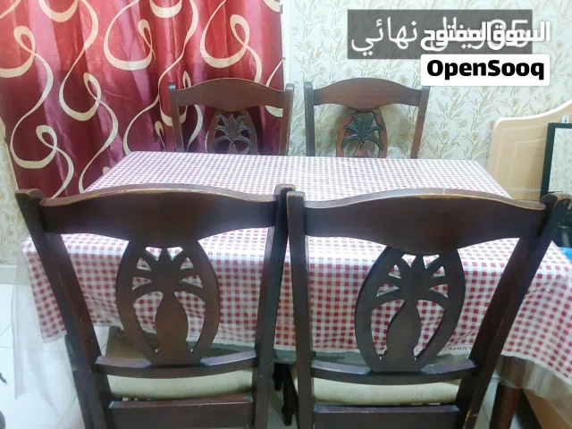 سفرة خشب مع اربع كراسي 25ريال