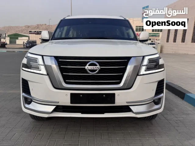 نيسان باترول تيتانيوم مكينة الكبيره V8 اول مالك من وكالة مفتاحين الوكالة + سماعات صبغ قطعتين فقط