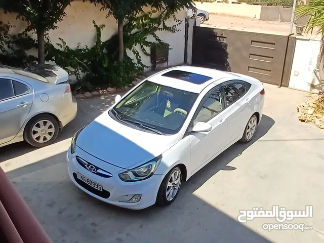 هونداي اكسنت موديل 2013 فل كامل عدا الجير(عادي) 1R سيارة اقتصادية جدا بتمشي 300 بالتنكة عن تجربة