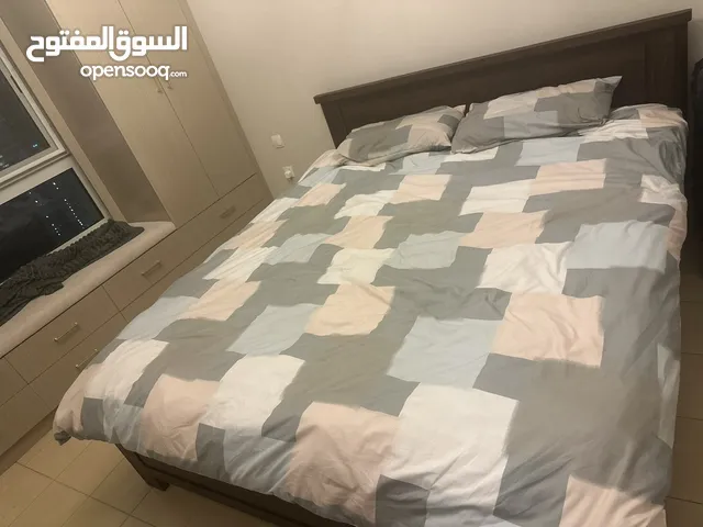 Stylish king size bed with comfortable mattress