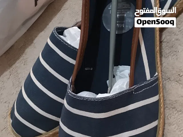 ملابس ماركات   كزيوني