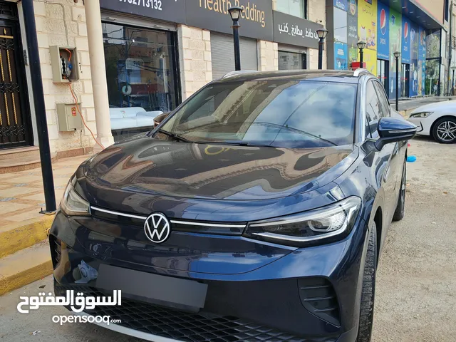 ID4 Pure+ 2021 لون كحلي مع فتحه وفرش جلد لون خمري