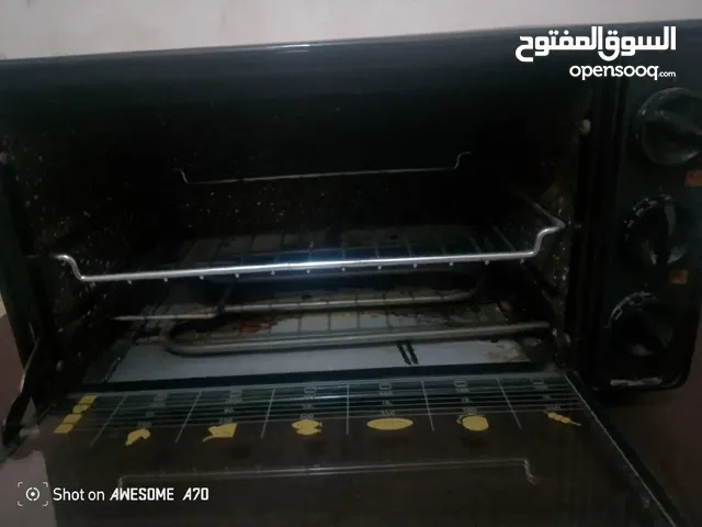 Four électrique en bon état à vendre