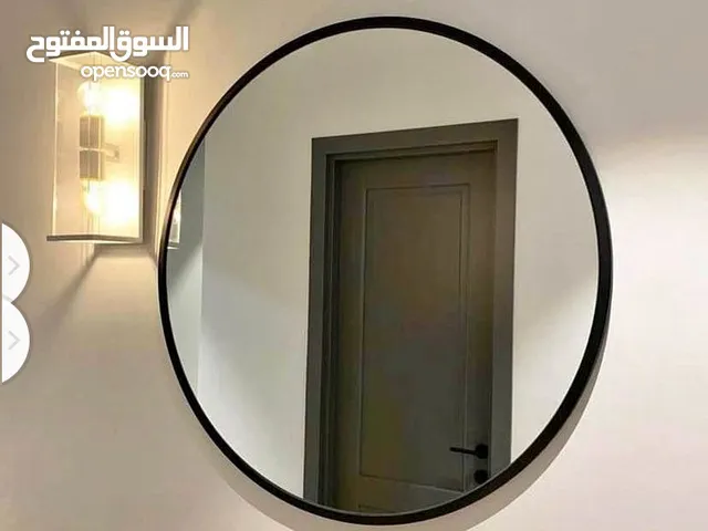مرايا دائرية شكل عصري بإطار معدن Modern mirror with metal frame