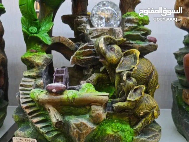 نافورة ديكور بمجرى ماء وشلال مضيء أضف لمسة من الهدوء والجمال الطبيعي لبيتك أو مكتبك مع هذا التصميم .