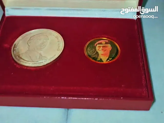 عملة فضة بوزن اونصه