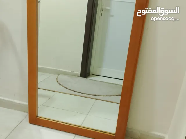 مرايا حائط كبيره مع برواز خشب