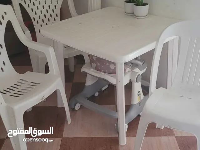 plastic table with 3 chairs