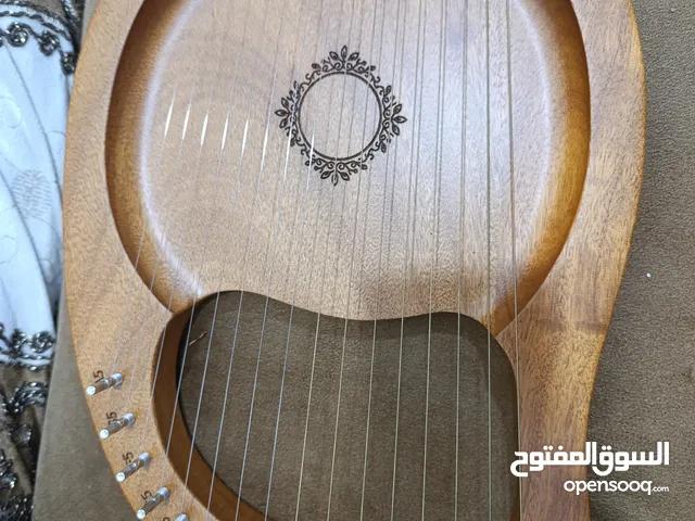 اله قيثاره جديده بالجنطه 16 وتر صاج