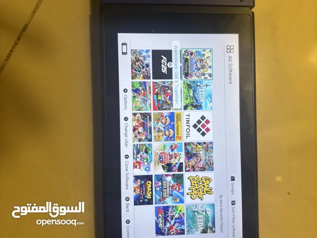 Moded Nintendo switch (tinfoil +16games) joycons original with micro sd 128GB to save more games