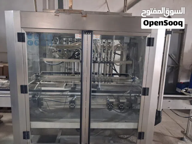 packing and filling machine -Automatic 10 Nozzle heads (For cosmetics and liquids Gel) ماكينة تعبئة