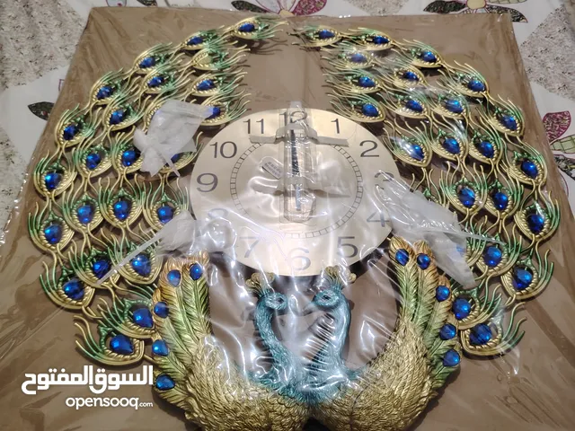 ساعه حائط على شكل طهوس نحاس