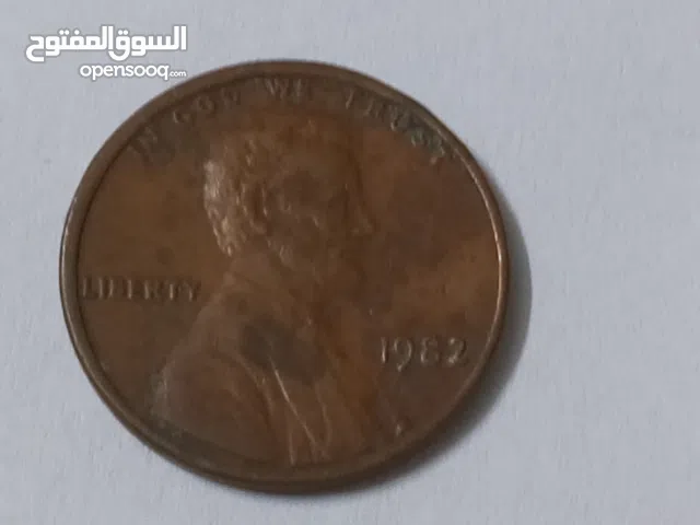 سنت أمريكي نادرة  أخطأ سك بالحرف الدائري 1982 وخطأ وجود ندوب بوجه الرئيس الأمريكي 1978